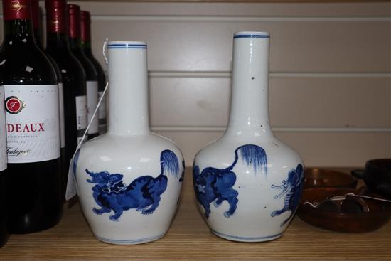 A pair of Chinese blue and white bottle vases tallest 22cm